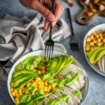 Green Goddess Chicken Salad in a bowl with a fork