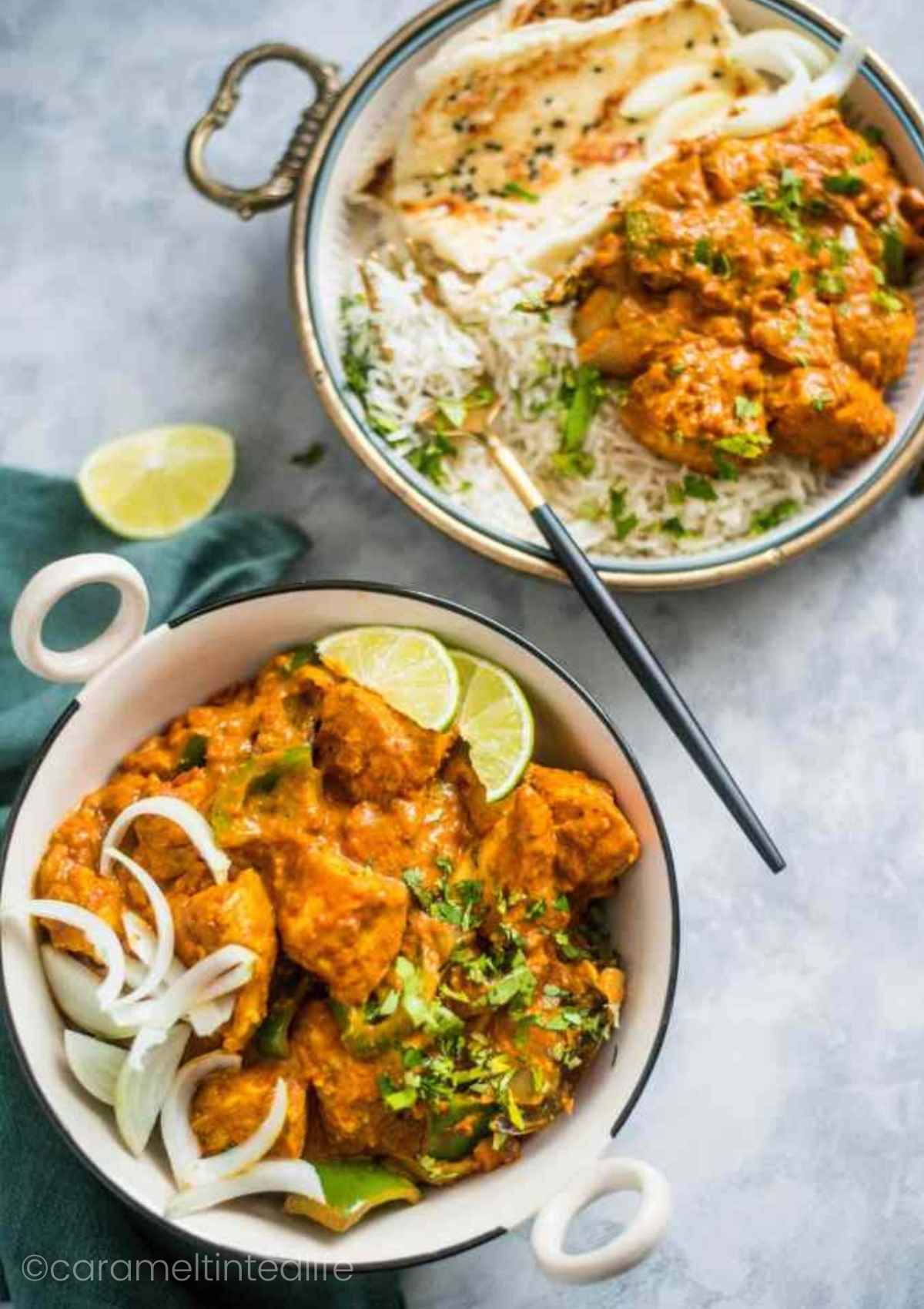 Kadai Chicken served with rice and naan viewed from the top