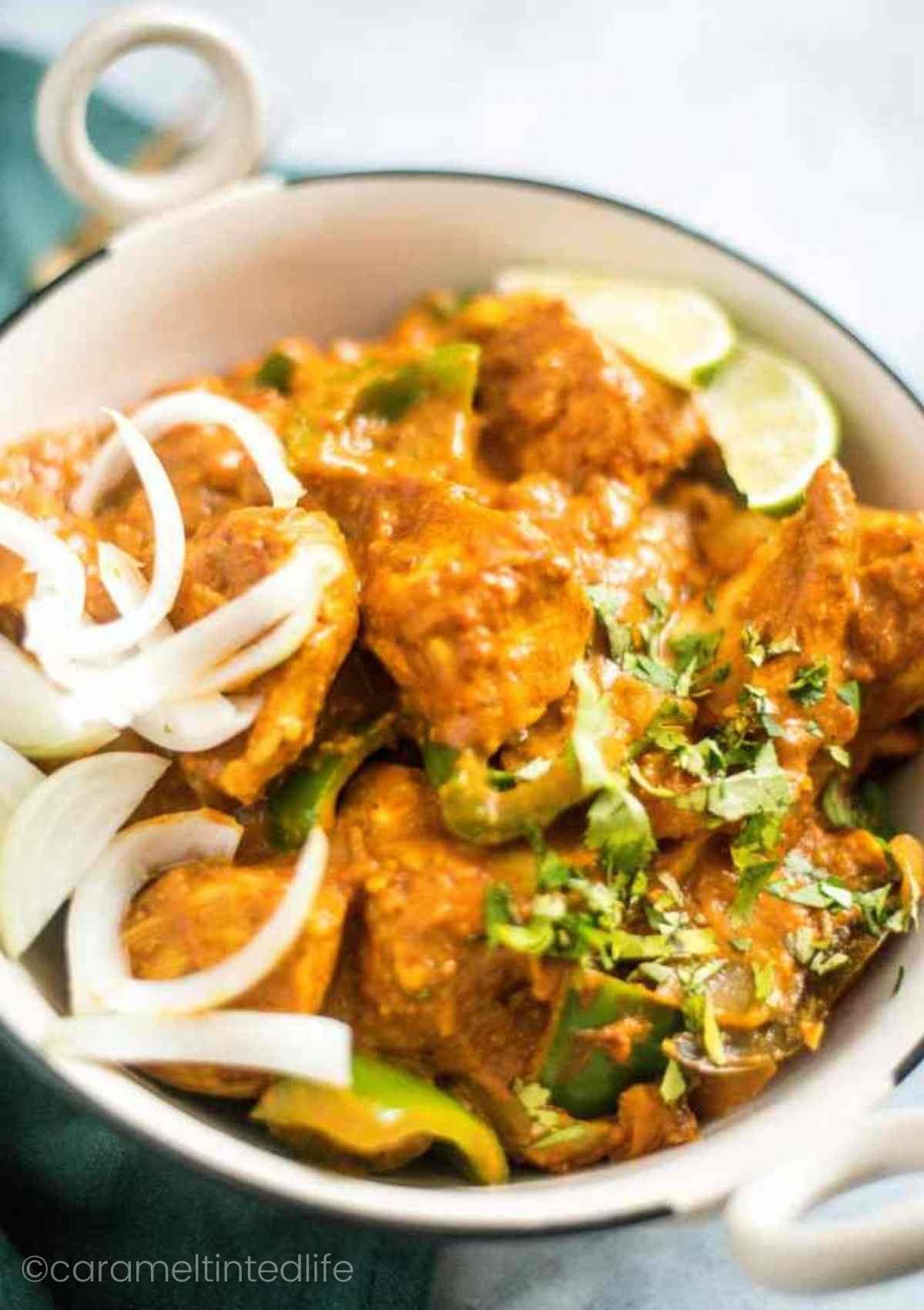 Kadai Chicken served in a bowl with rice