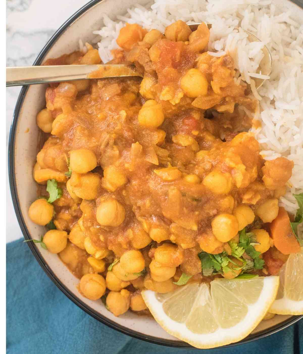 chickpea tagine served in a bowl with rice