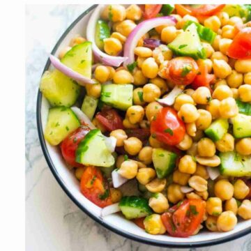 chickpea salad in a bowl with a fork