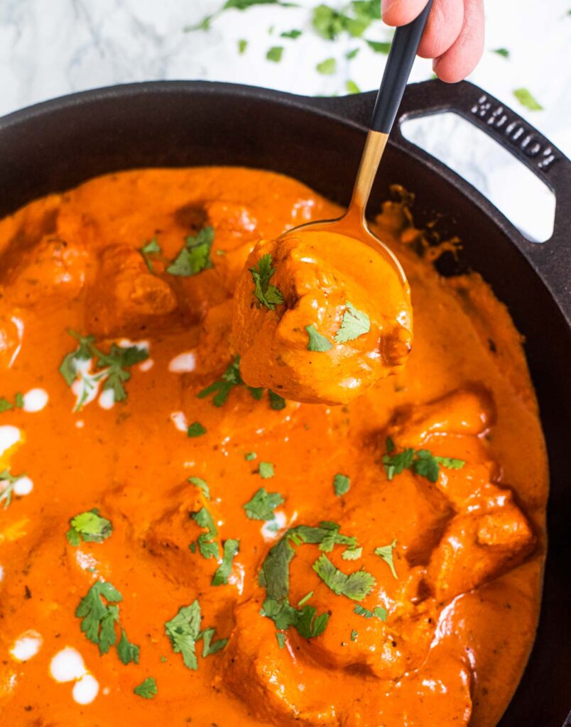 Butter Chicken served in a cast iron pot