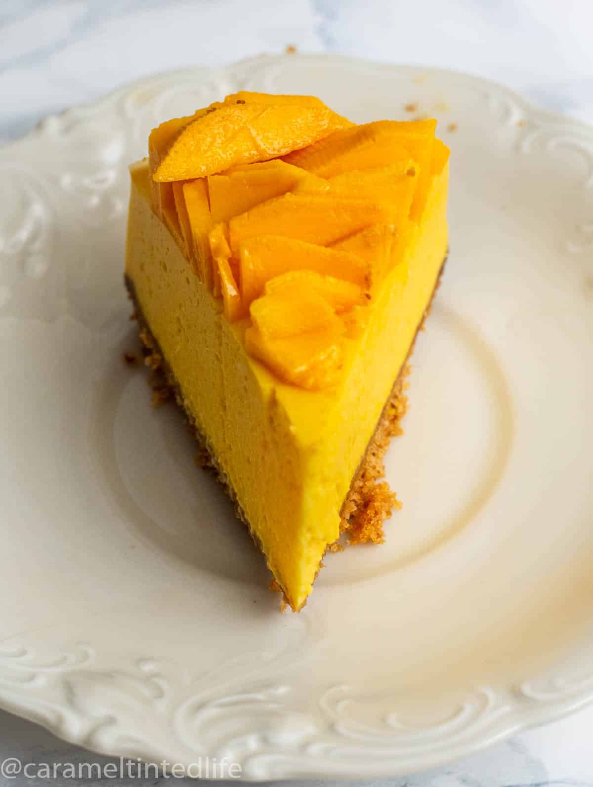 A slice of mango cheesecake