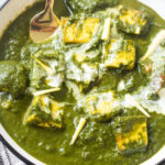 Close up view of saag paneer in a bowl