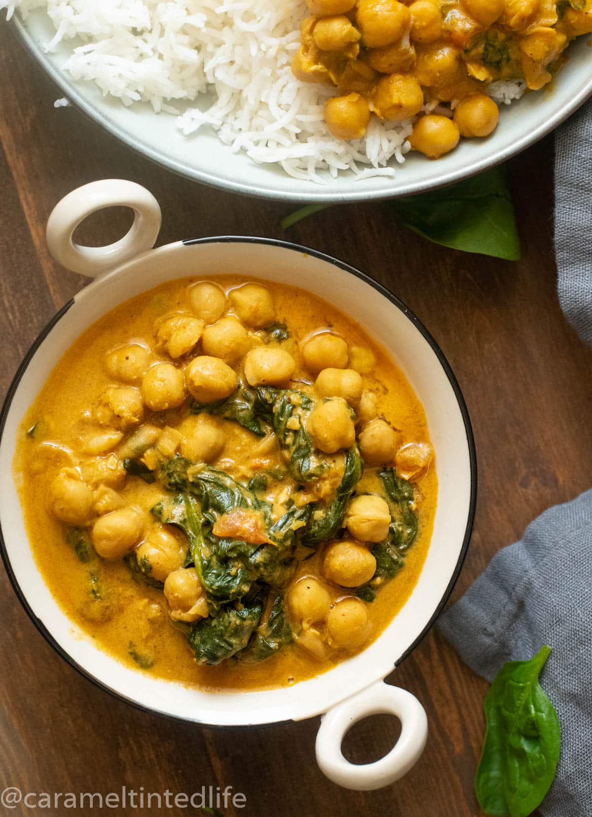 Chickpea coconut curry served in a small bowl