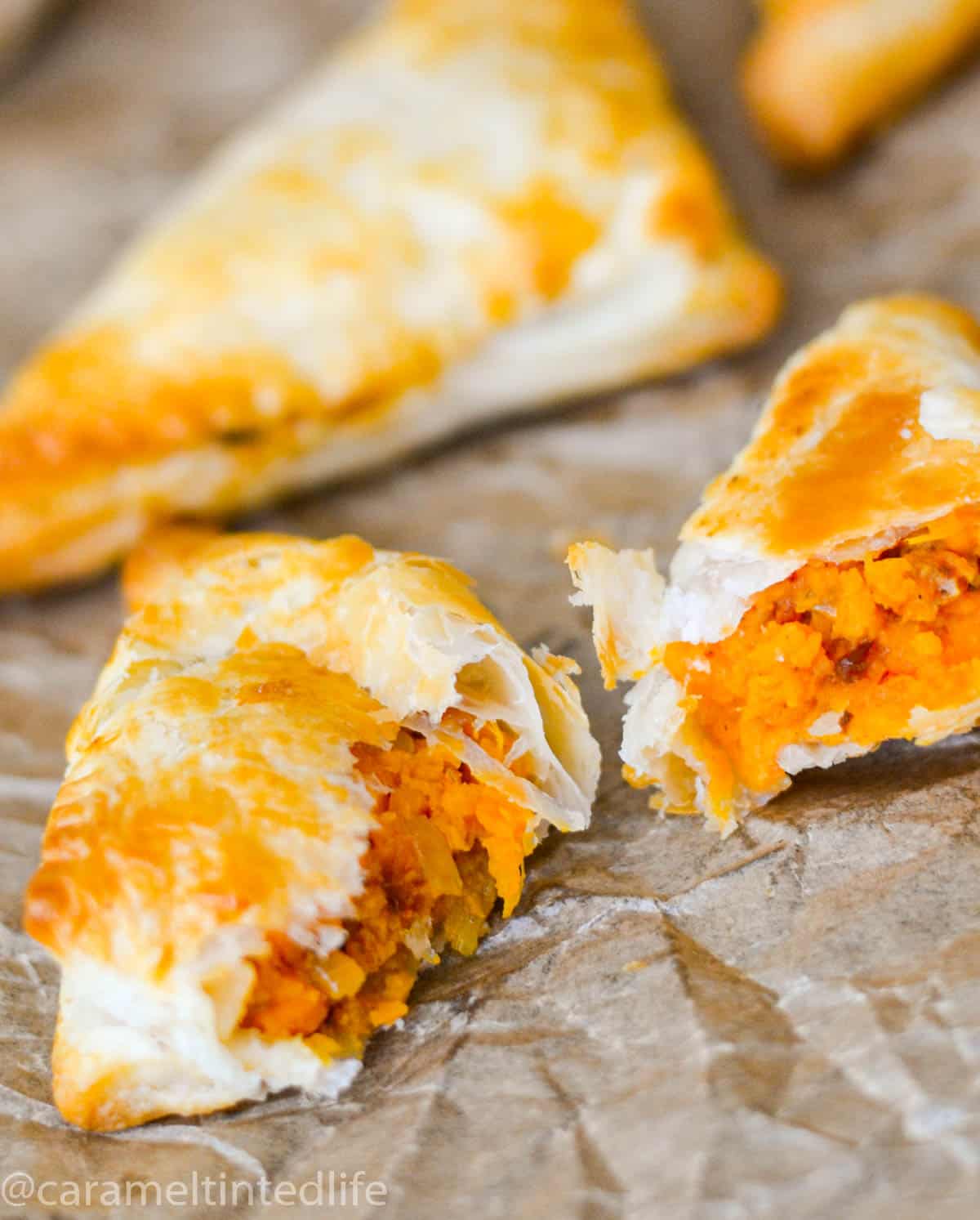 Puff pastry samosas broken into two