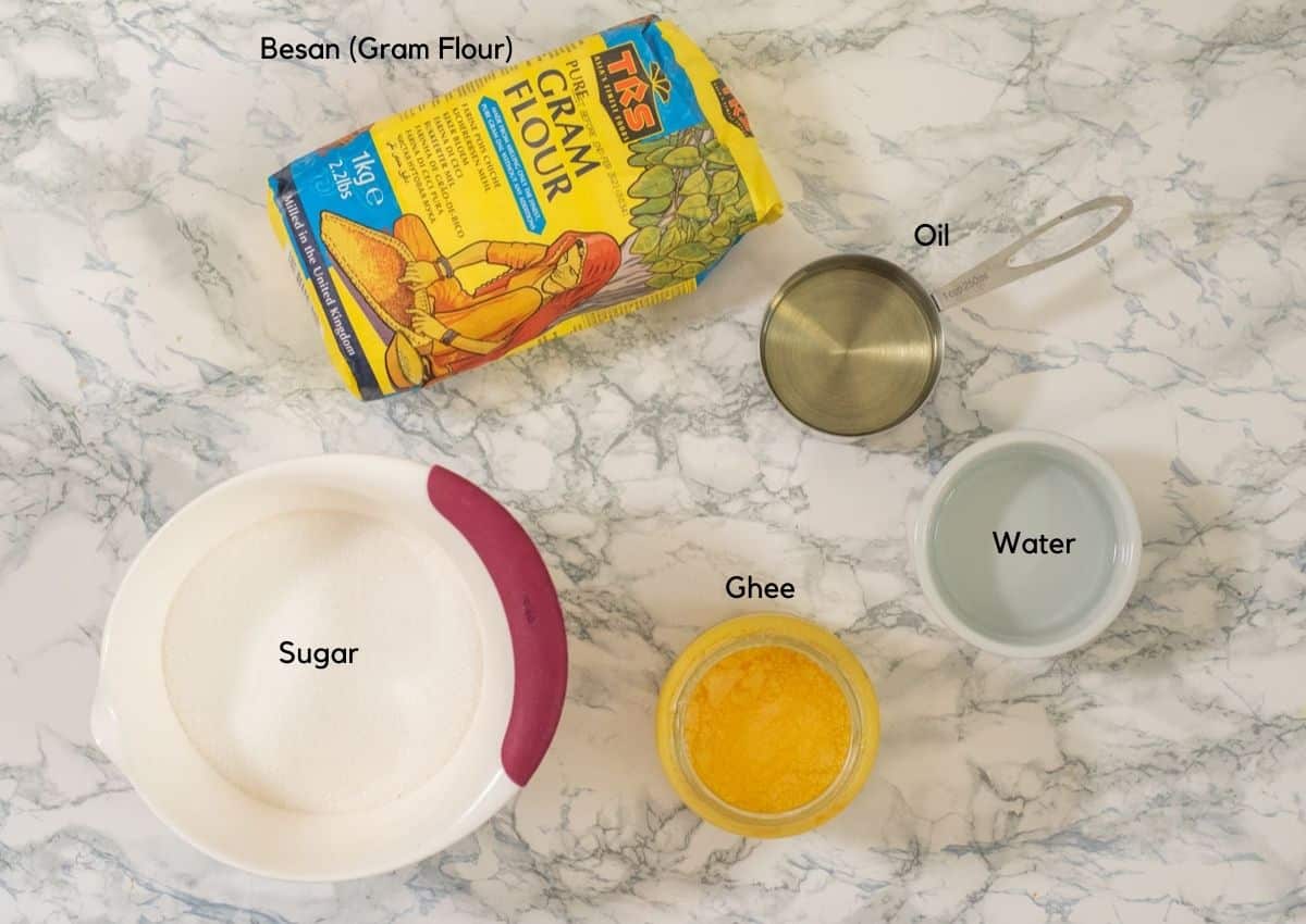 Ingredients for making mysorepak including besan, oil, ghee, sugar and water