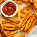 close up of sweet potato fries with ketchup