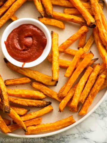 close up of sweet potato fries with ketchup