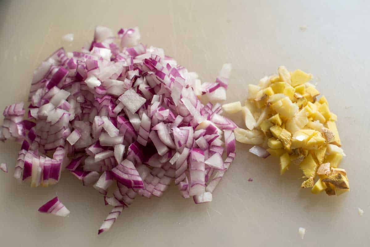 chopped red onion and ginger garlic