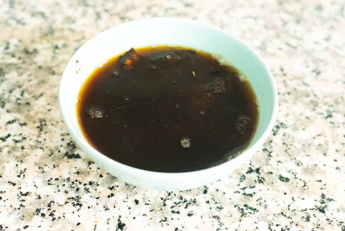 tamarind water in a blue bowl