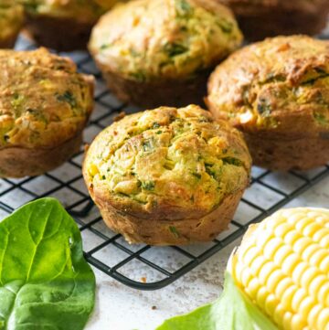 a tra cooling rack with savory muffins