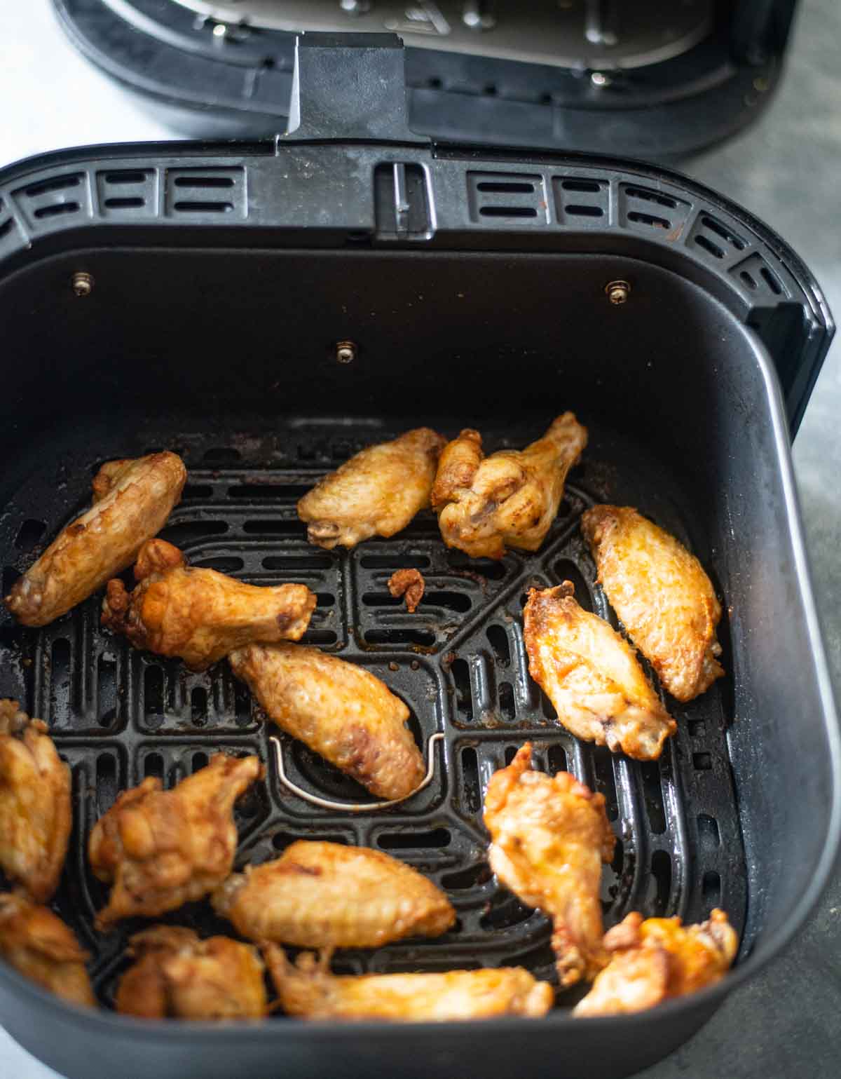 air fryer basket with chicken wings