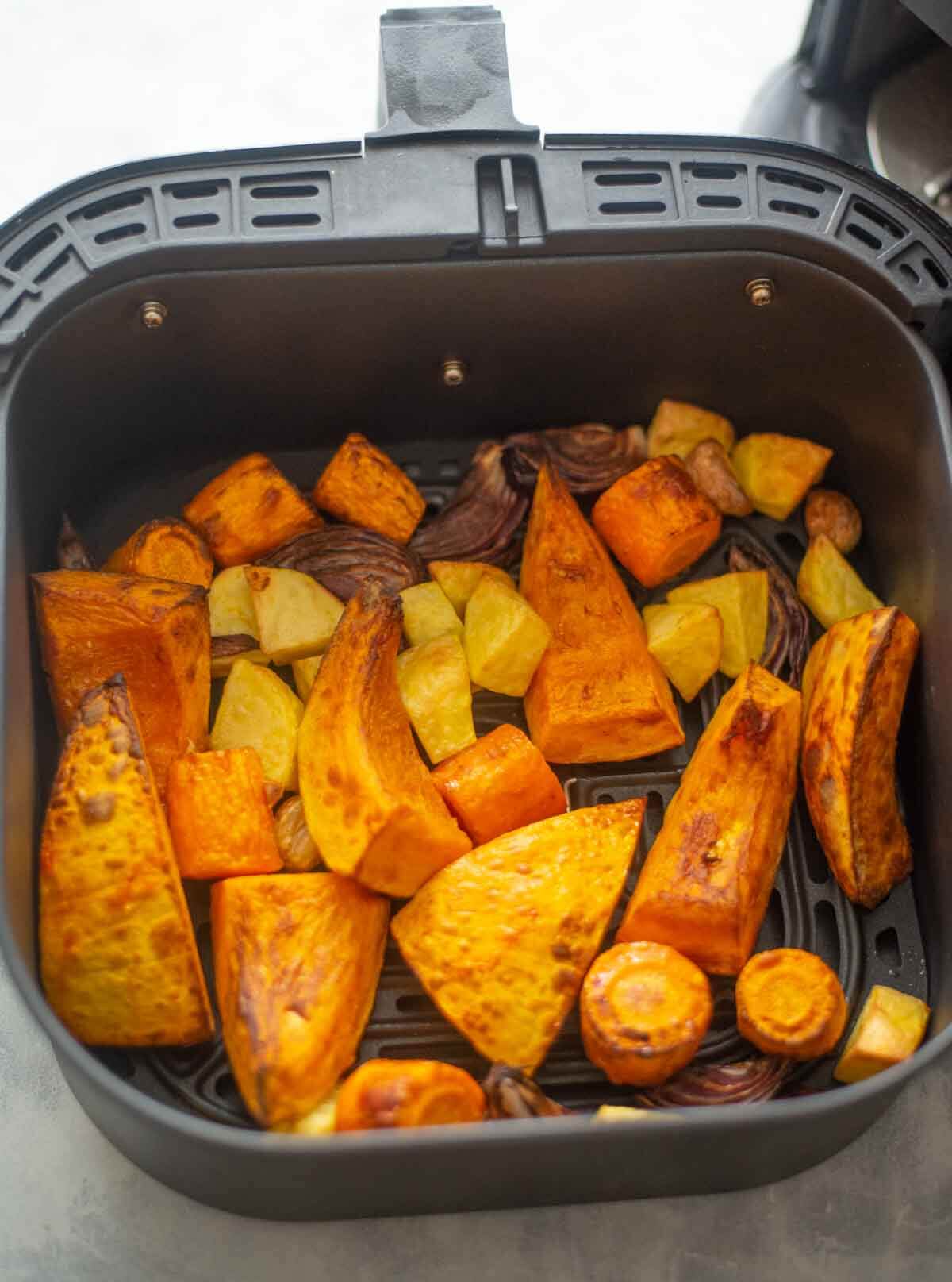 roasted pumpkin and veggies in air fryer basket