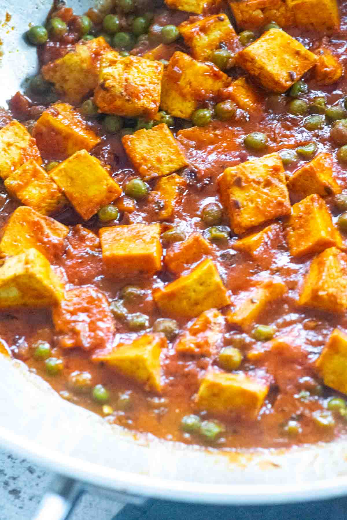 paneer curry in a large wok