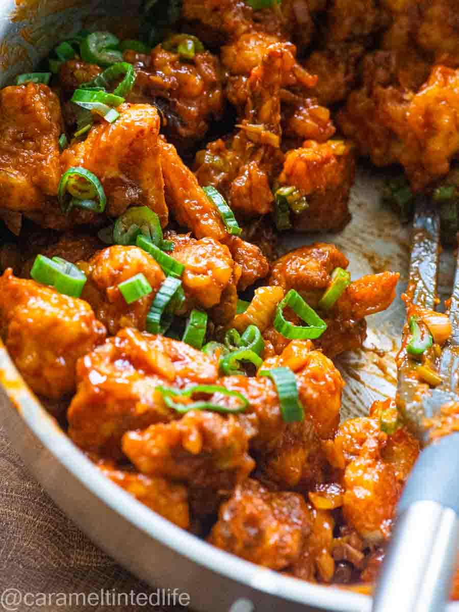 gobi manchurian in a pan with spatula